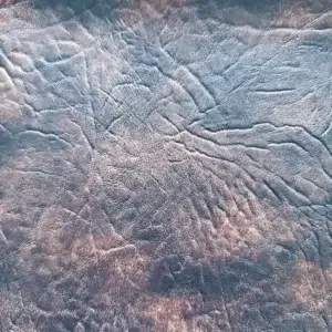 Distressed leather King Ranch in Black Saddle Brown with deep vintage grain texture for automotive, marine, and luxury hospitality applications