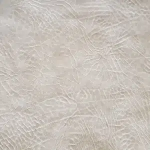 Distressed leather King Ranch in Earth Tan with vintage grain texture for automotive, marine, and cigar lounge seating