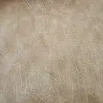 Distressed leather King Ranch in Sandstone Tan with vintage grain texture for automotive, marine, and cigar lounge interiors