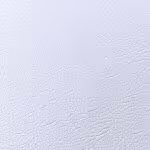 Close up texture of EchoMer smooth leather grain vinyl in Ice White showing micro creases.