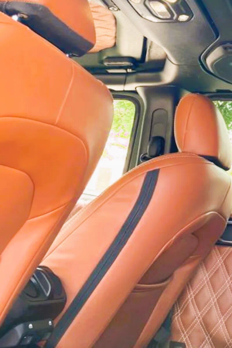 Jeep Wrangler interior reupholstered with terracotta soft grain faux leather upholstery material