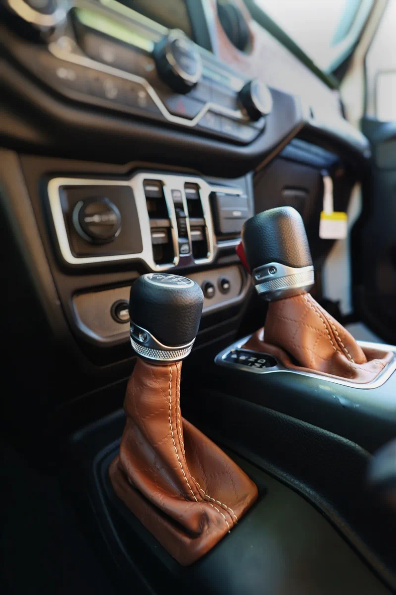 Morocco brown custom shifter boot and console trim installed on a Jeep interior using Joya Mer
