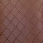 Quilted diamond vinyl texture in Brown Morocco from Joya Mer