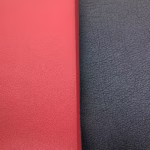 Flat pebble grain faux leather texture in Botany Mer upholstery fabric
