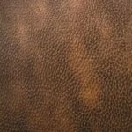 heavy duty marine vinyl in Antique Brown upholstered on a premium boat helm seat by Marvella.